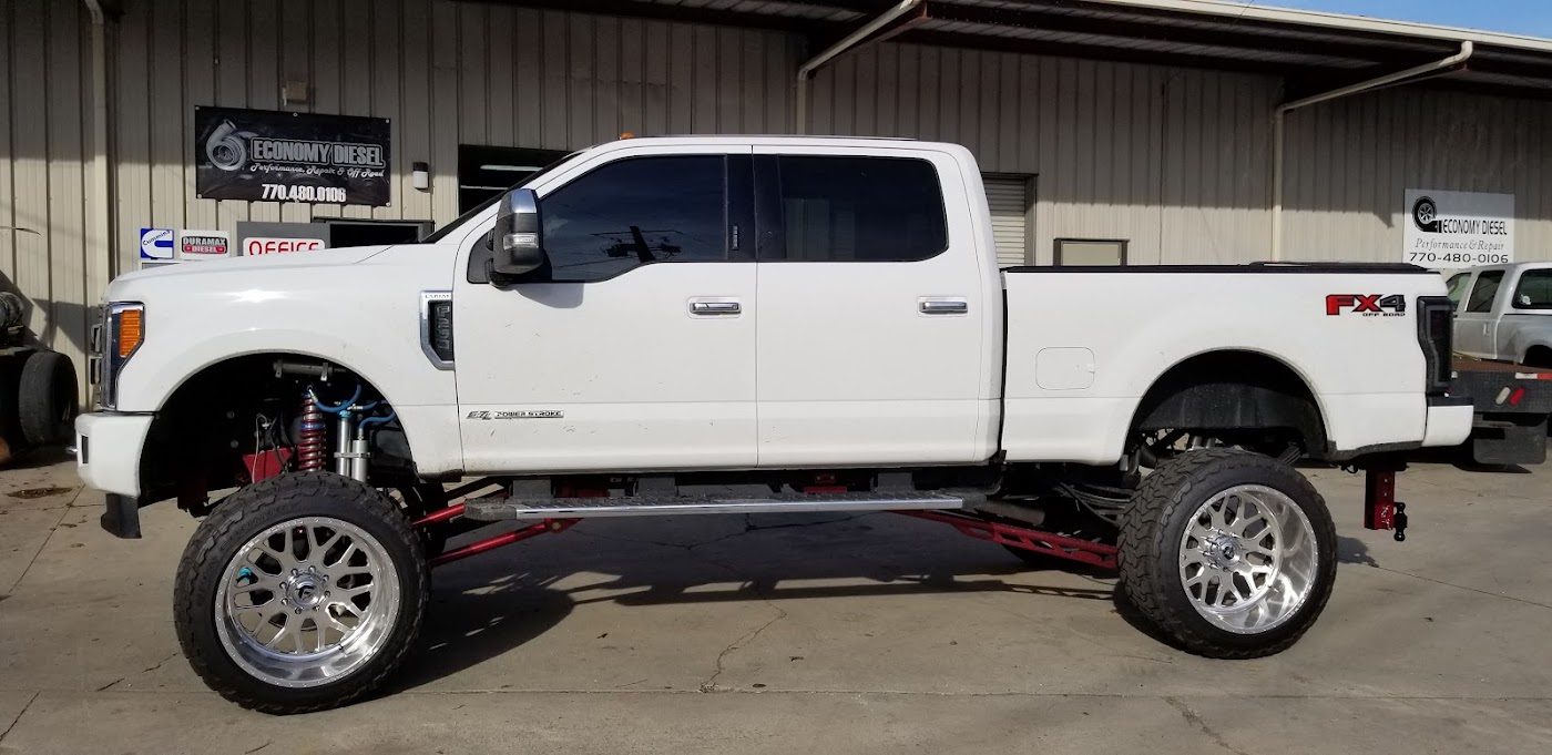 Lifted white pickup ready to go